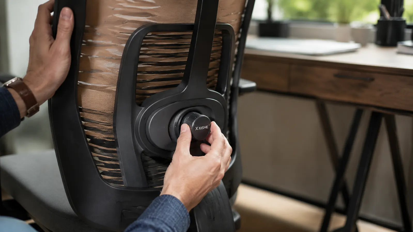Close-up of adjustable lumbar support on an ergonomic office chair