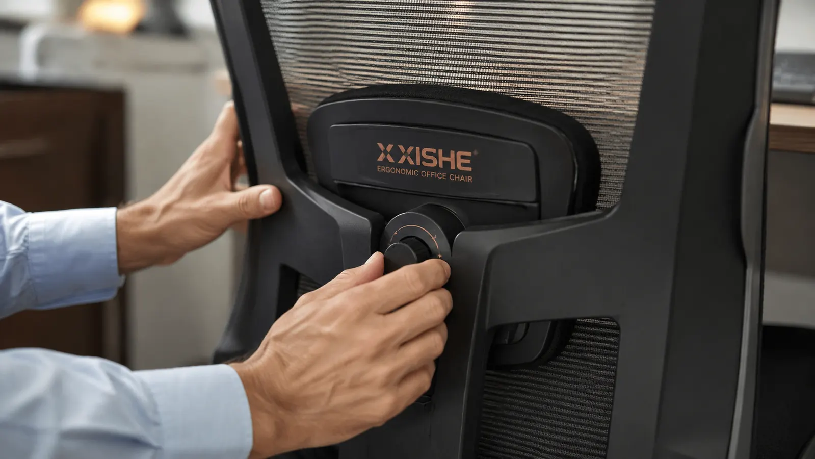 Person adjusting the lumbar support knob on the back of the X XISHE ergonomic office chair